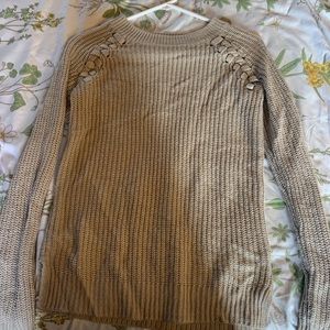 Cream sweater w/ braided detail at the shoulders